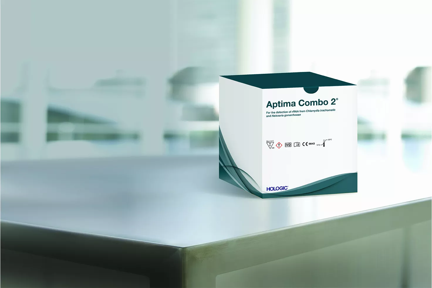 Caja de un ensayo con un laboratorio al fondo