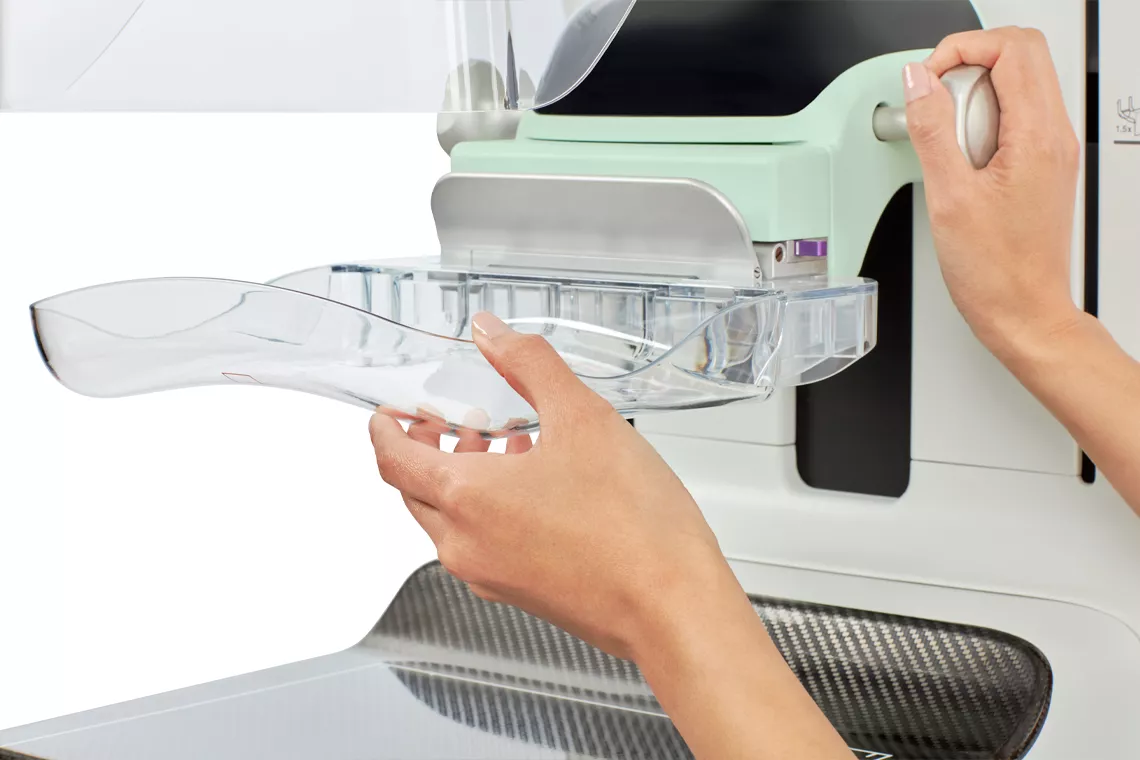 Sistema de estabilización de la mama SmartCurve con dos manos del usuario